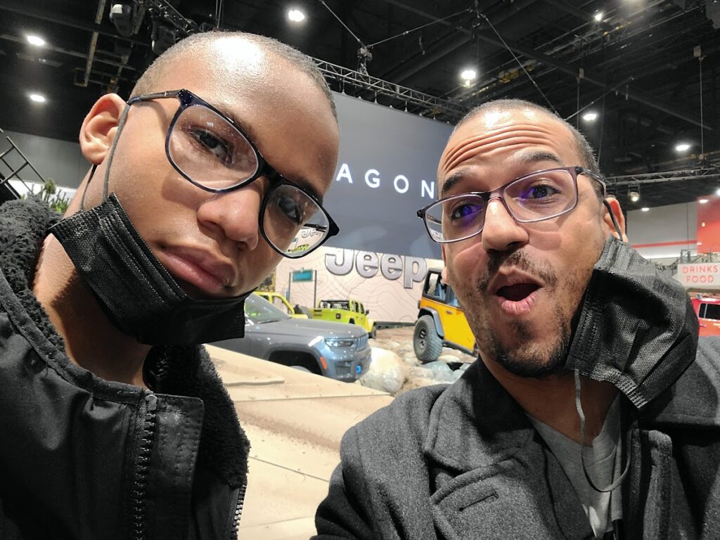 Copywriter Donnie Bryant and his son at the Chicago Auto Show